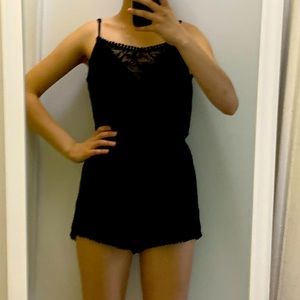 Size small back romper with a lacy top.